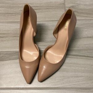Beautiful Nine West nude pumps. Never worn!